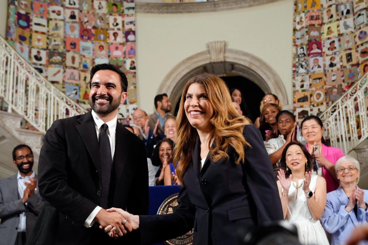 Zohran Mamdani, the mayor of New York City, and Julie Menin, the speaker of the city council, shake hands while announcing the 2027 budget on 30 June 2026 Photo: Ed Reed/Mayoral Photography Office via Flickr