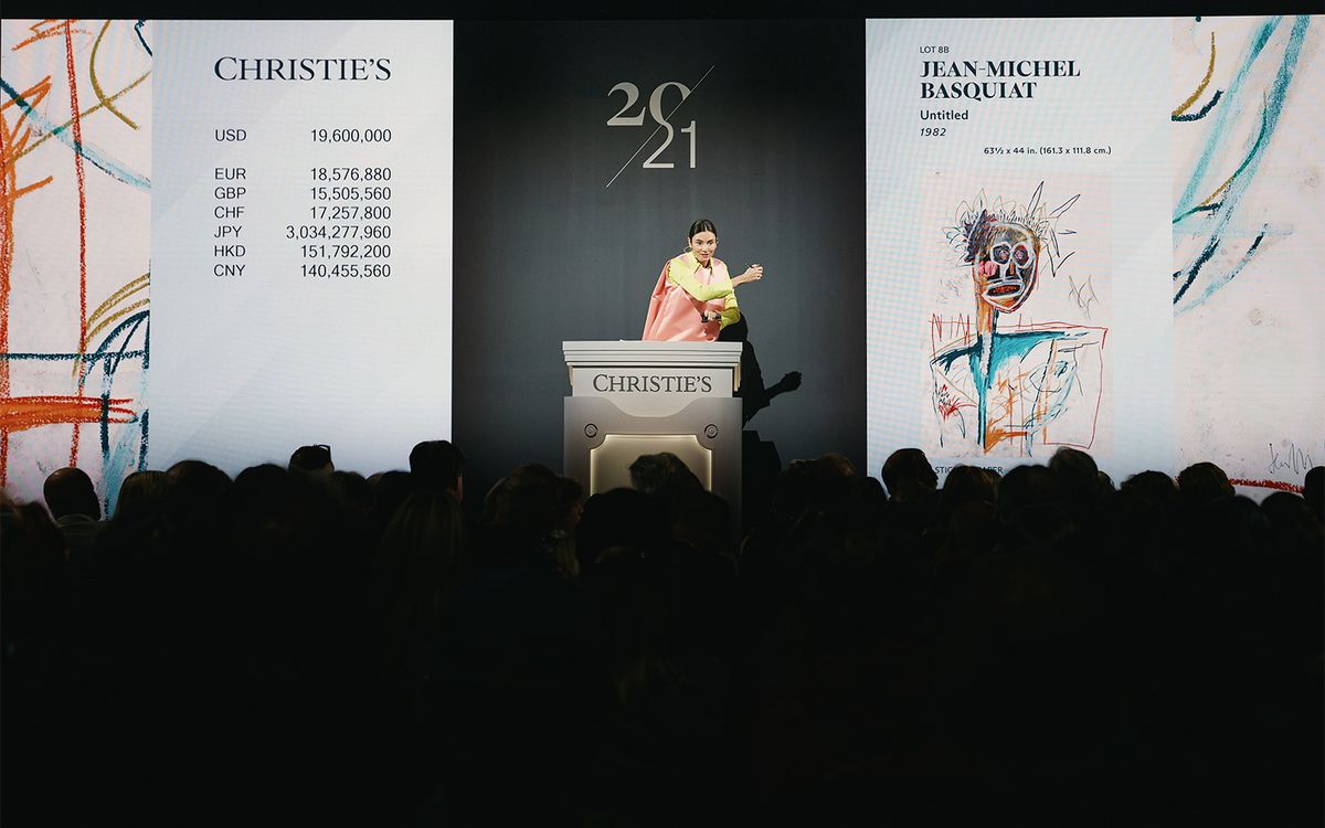 Auctioneer Georgina Hilton selling the most valuable lot of the evening, an untitled sketch from 1982 by Jean-Michel Basquiat. Courtesy Christie's