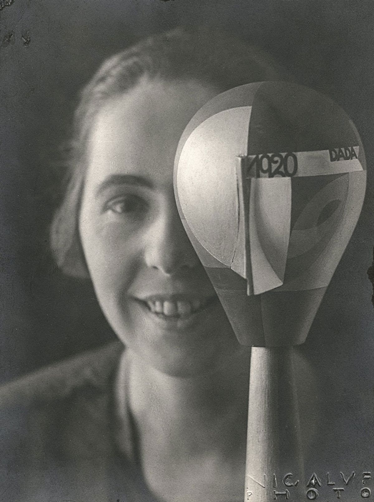 Sophie Taeuber-Arp with her Dada head sculpture, photographed by Nicolai Aluf in 1920 Stiftung Arp e.V., Berlin