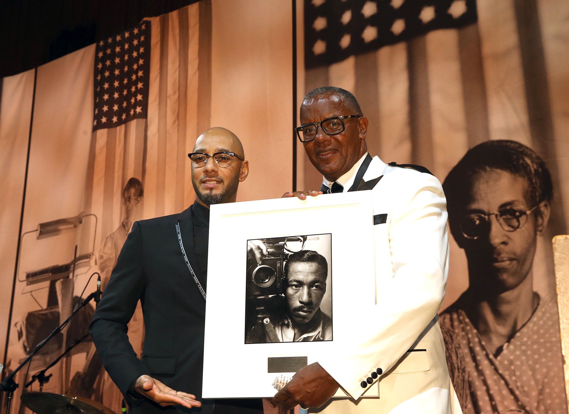 Kasseem Dean, aka Swizz Beatz, honours the documentary photographer Jamel Shabazz at the Gordon Parks Foundation gala Photo by Bennett Raglin/Getty Images for Gordon Parks Foundation