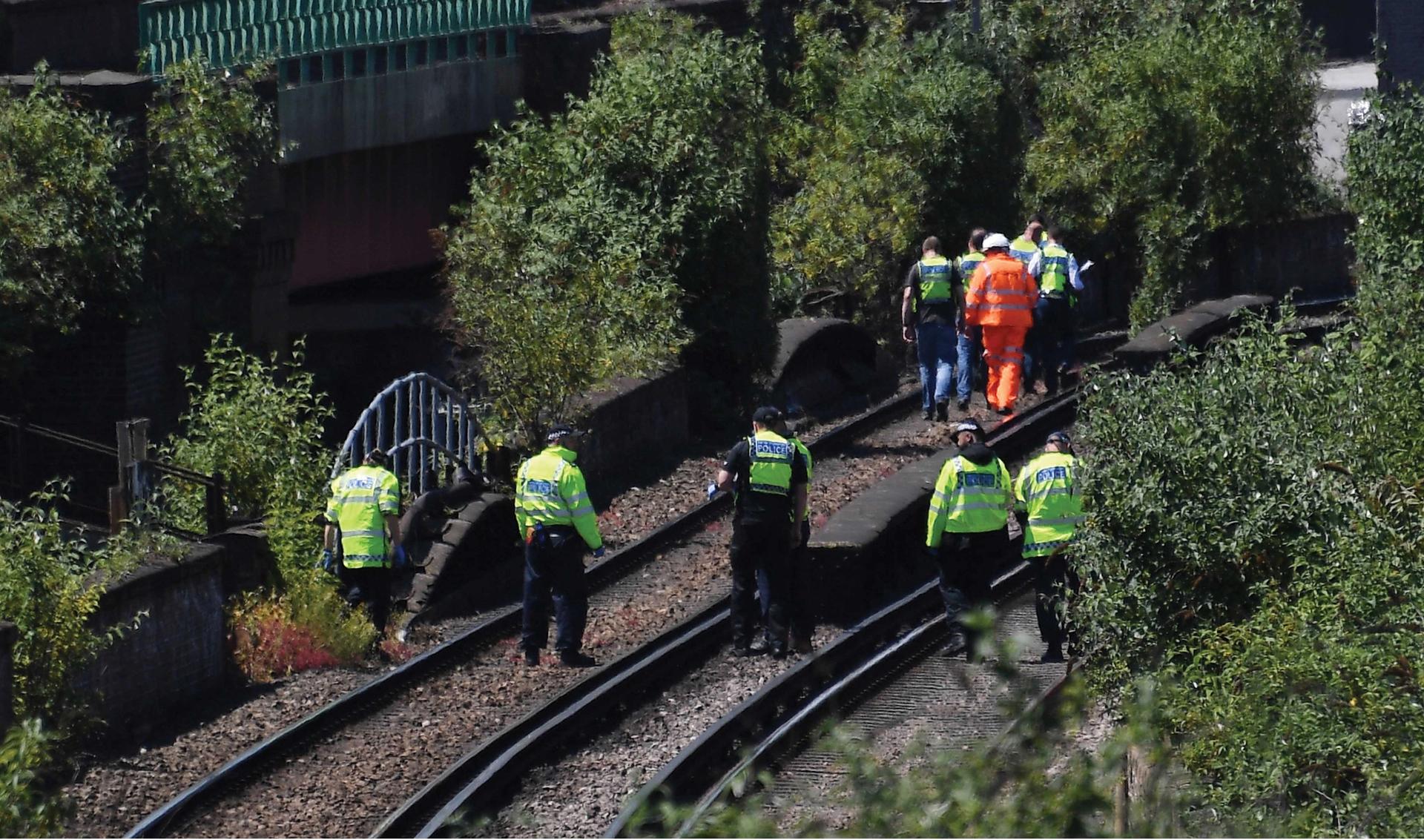 Police search rail tracks following a rail incident in south London on 18 June. British Transport Police (BTP) report that three bodies had been found on the tracks at Loughborough Junction Photo by Andy Rain/EPA-EFE/REX/Shutterstock (9719407b)