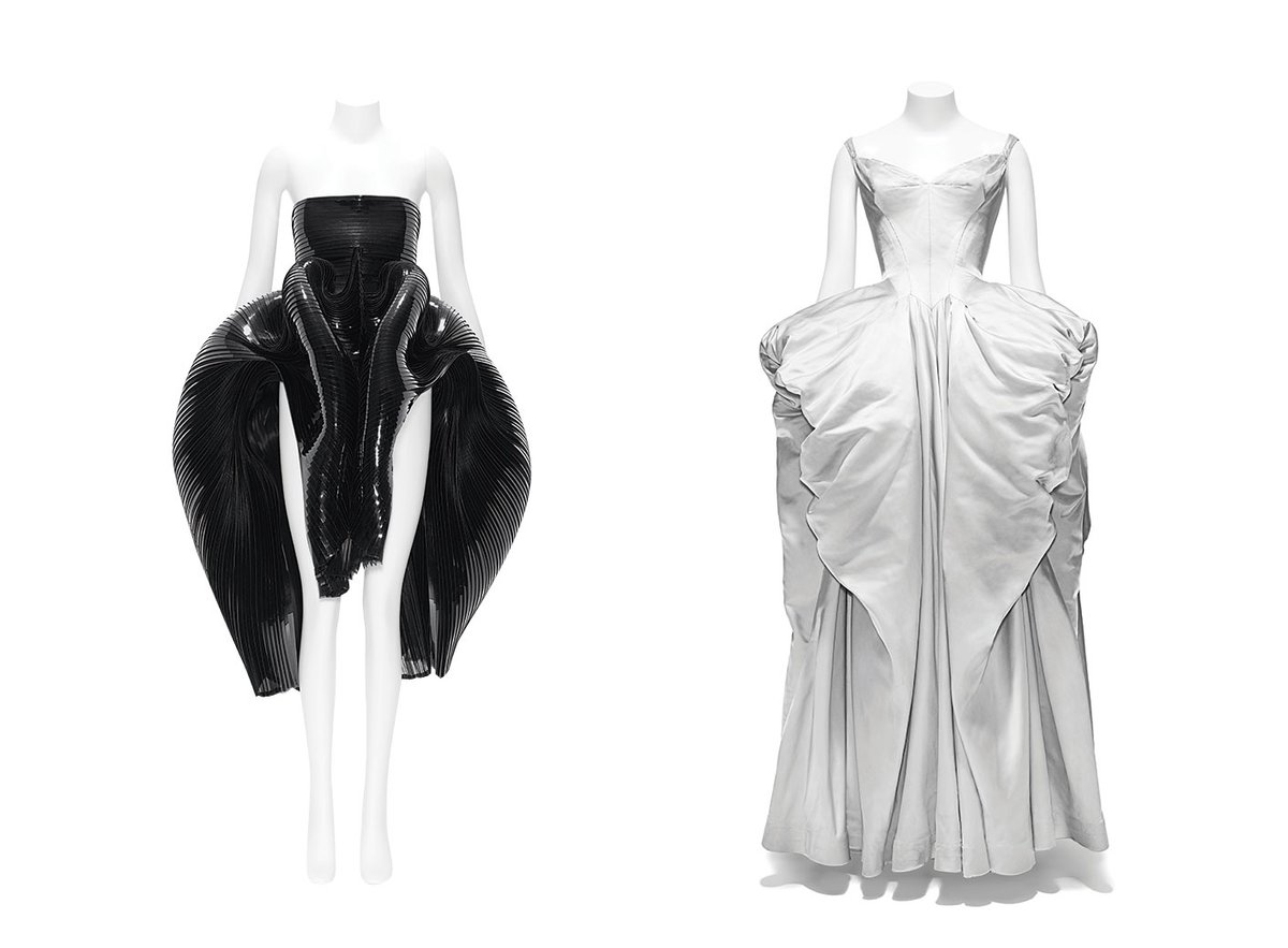 A PVC dress by the Dutch designer Iris Van Herpen (Autumn/Winter 2012-13) is shown alongside a 1950s silk ball gown by Charles James in the Met's Costume Institute show About Time