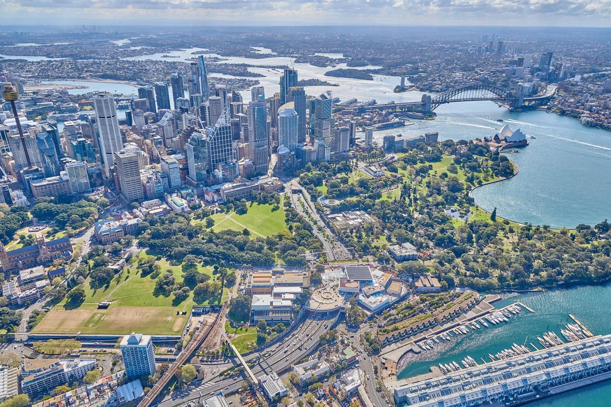 The Art Gallery of New South Wales sits close to Sydney Harbour and the world-famous Opera House. The site straddles a motorway in the lower centre of the image © Art Gallery of New South Wales