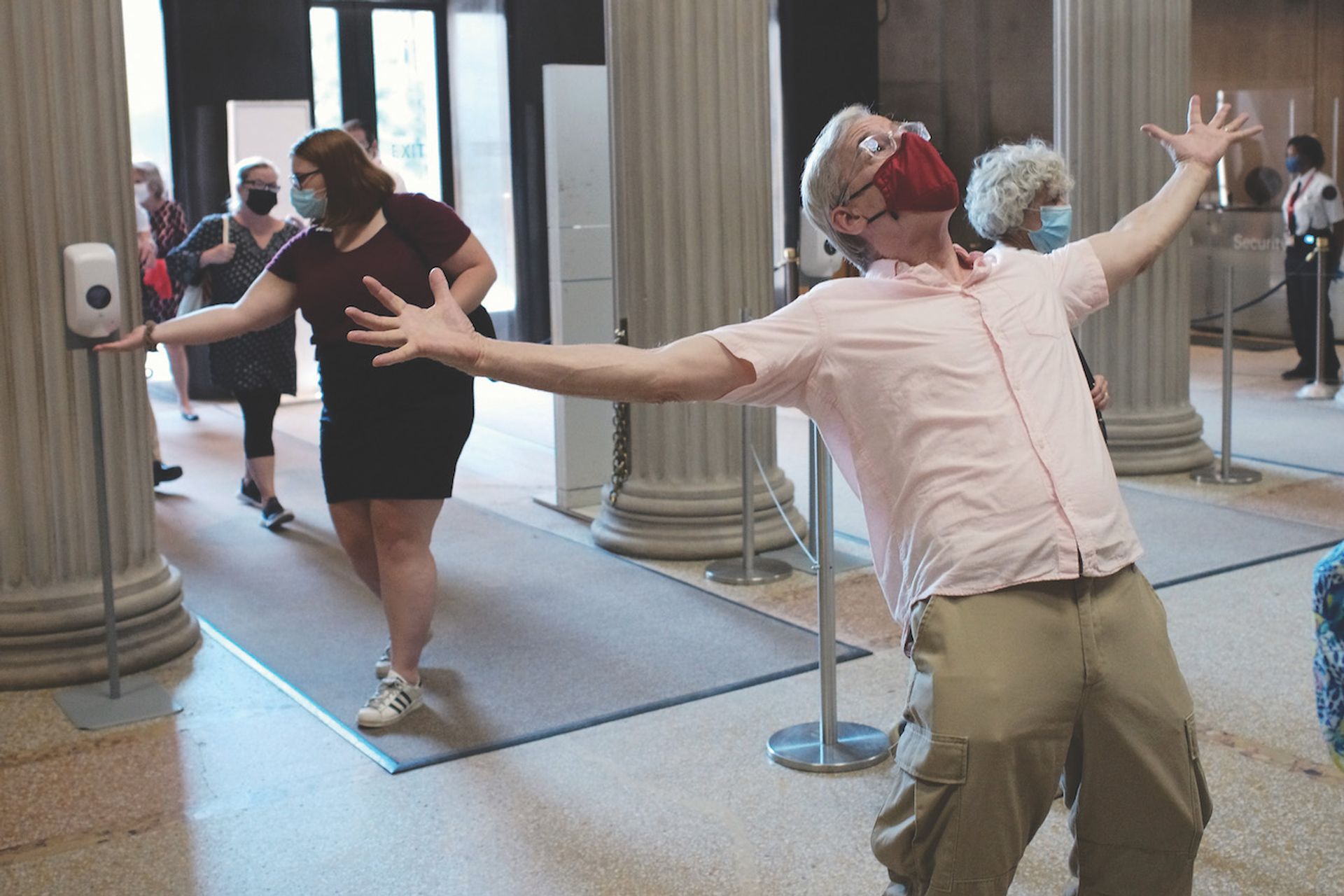 A visitor celebrates the reopening of the Metropolitan Museum in New York in August Taylor Hill/Getty Images
