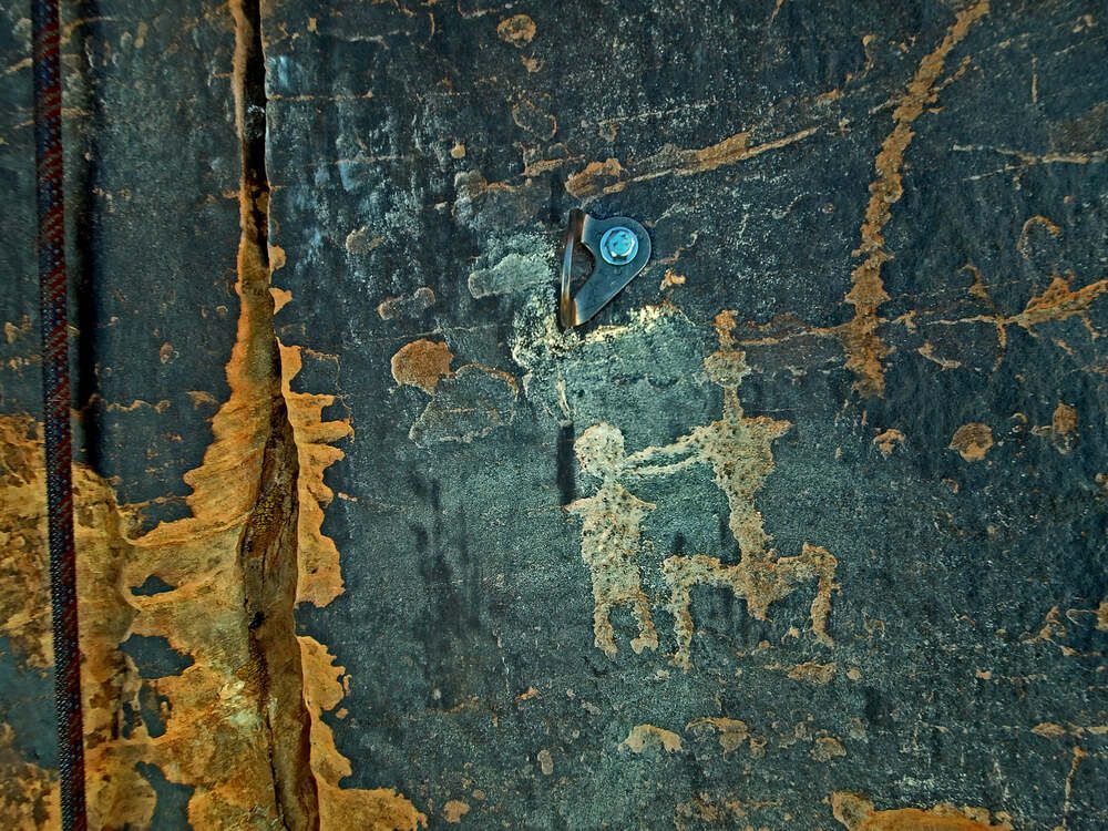 The Sunshine Wall was damaged after a climber installed climbing bolts on and around several ancient petroglyphs Darrin Reay