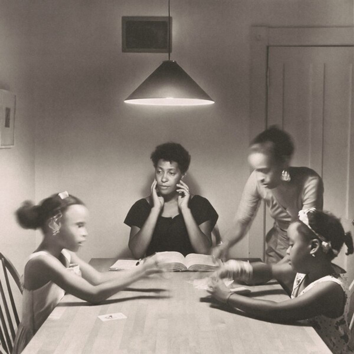 Carrie Mae Weems’s Untitled (Woman and Daughter with Children) from The Kitchen Table Series (1990) Courtesy the National Gallery of Art, Washington, DC