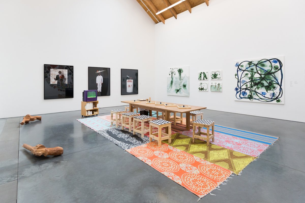 Installation  view: Barthélémy Toguo: The Beauty of Our  Voice at the Parrish Art Museum. Foreground:  Mobile  Cafeteria (2018). Rear: Stupid  African  President (2006).  Right: Homo  Planta (2018). Jenny  Gorman