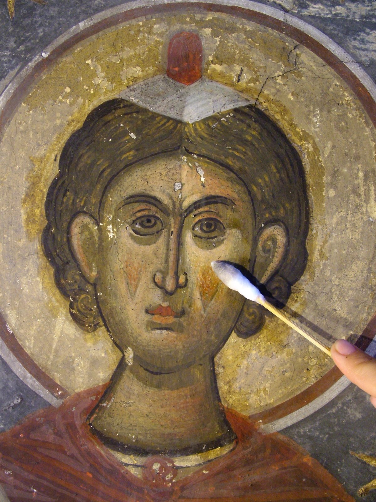 "Watching the dirt and varnish recede inch by inch as the original painting emerges is like reaching back in time, to when it was on the artist’s easel." Photo: CERECS ART S.R.L.