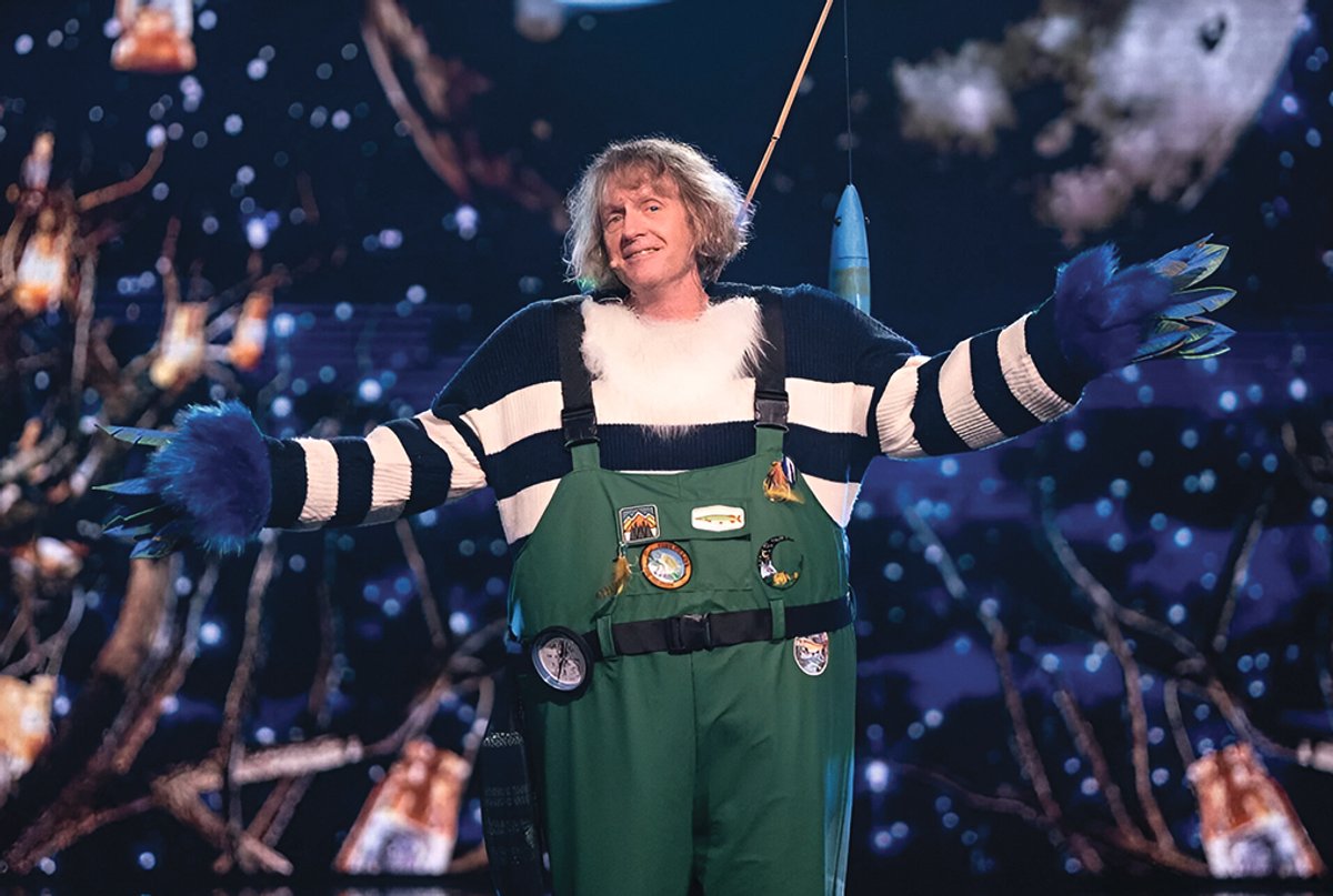 Surprise, surprise! Grayson Perry in a designed-by-someone-else kingfisher outfit (apparently) reveals he’s not Harry Hill at all
ITV