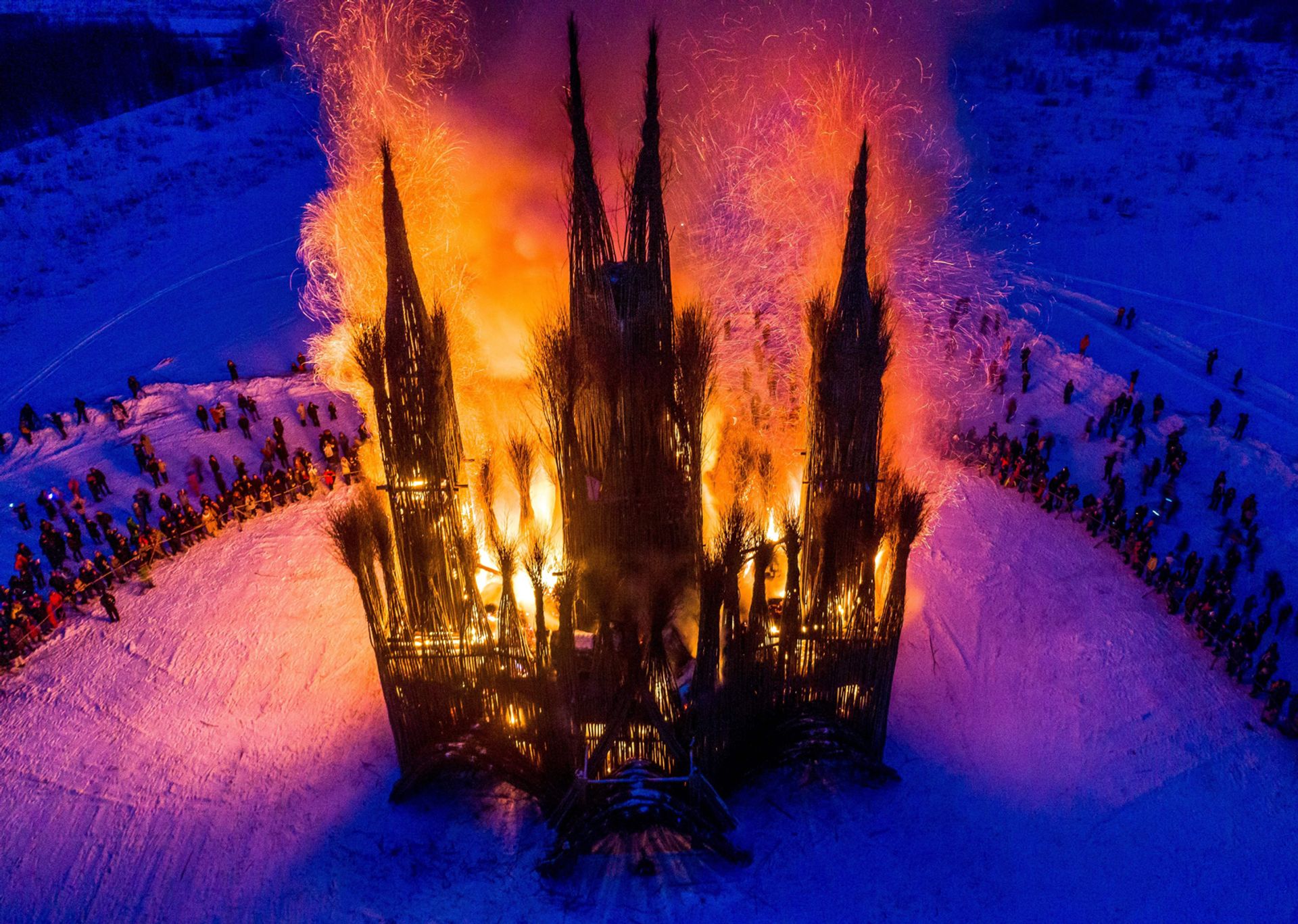 The controversial burning of the 30m Gothic-style structure built of twigs by the Russian artist Nikolay Polissky DMITRY SEREBRYAKOV/AFP/Getty Images
