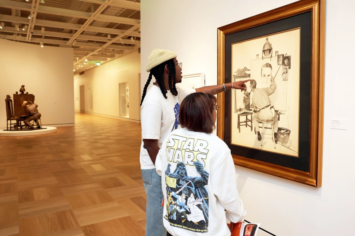 The museum has a gallery devoted to Norman Rockwell, which includes a newly commissioned bronze (at left) of the artist’s witty 1960 Triple Self-Portrait Photo: Stefanie Keenan/Getty Images for Lucas Museum of Narrative Art