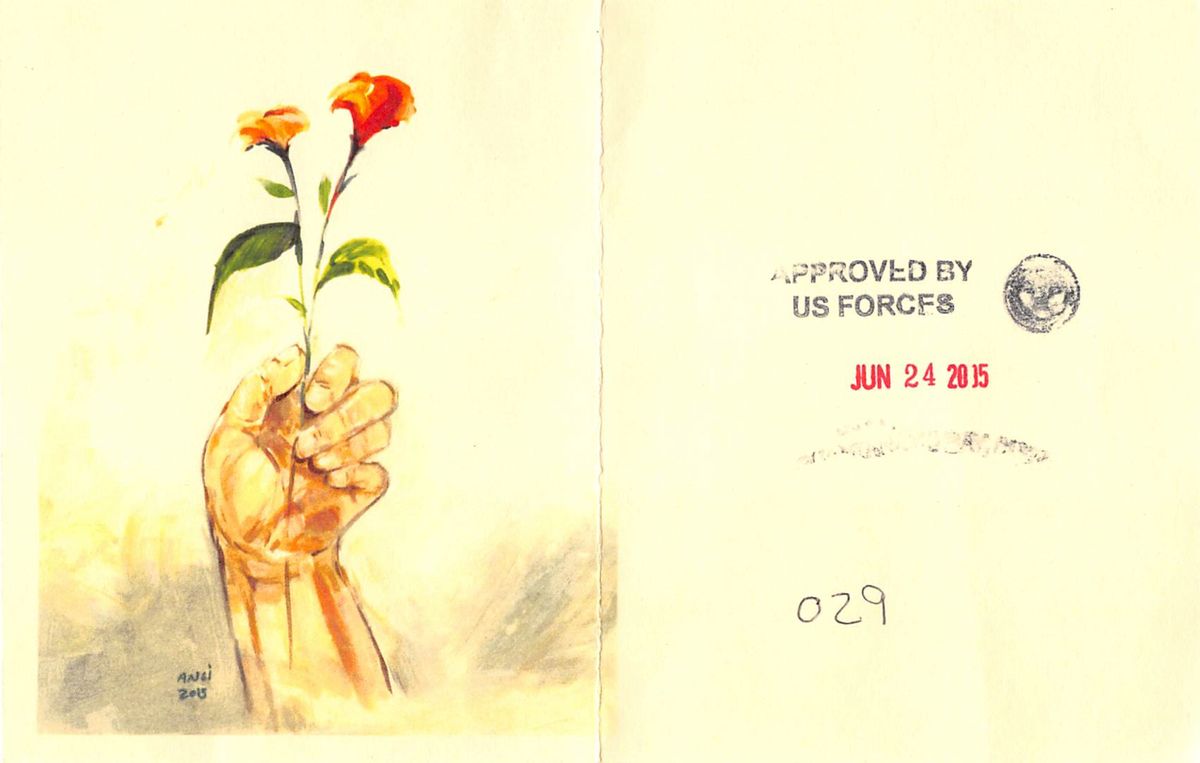 Muhammad Ansi, Hand Holding Red Flowers (2015), colour photocopy of original and reverse, showing stamps indicating approval for release from Guantánamo Muhammad Ansi
