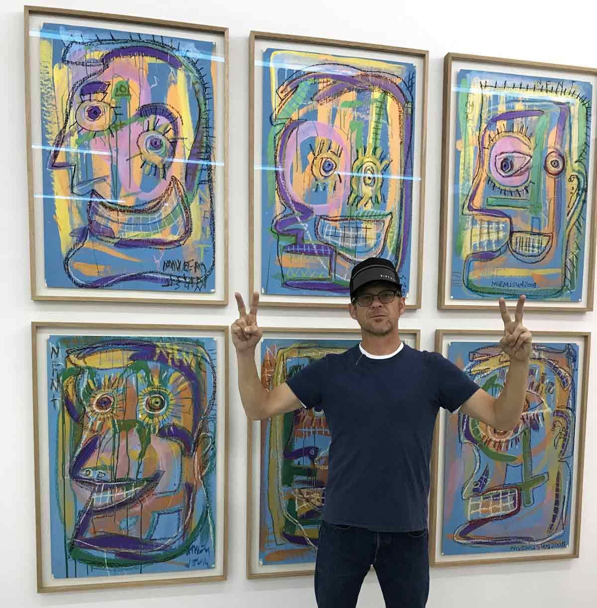 Jason Newsted in front of his works at Frame art fair Photo courtesy of 55Bellechasse gallery