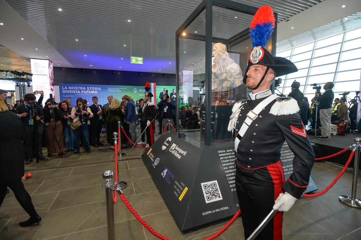 Bernini's Salvator Mundi looks over passengers at Rome's Fiumicino Airport 
courtesy AEROPORTI DI ROMA