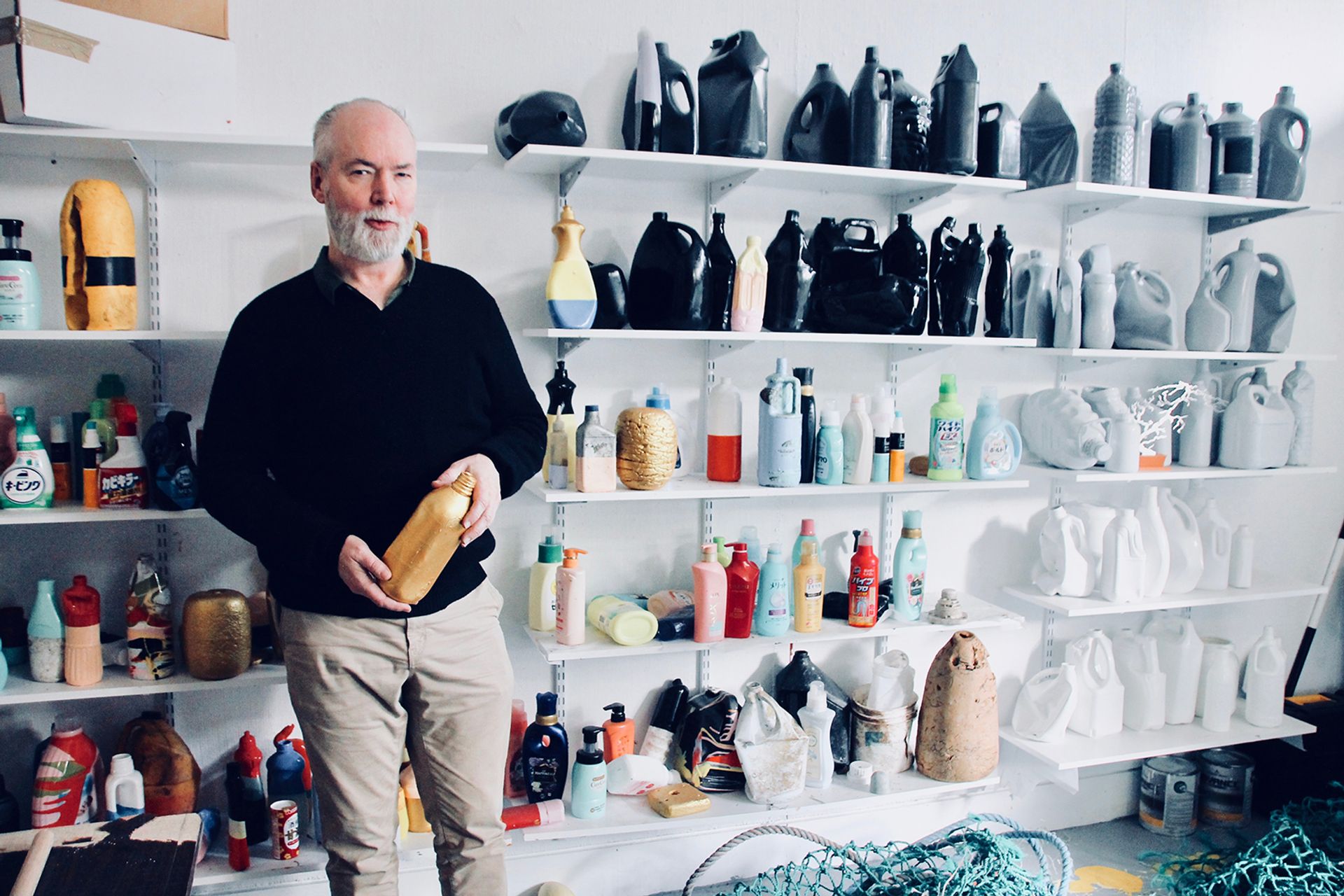 Douglas Coupland in his studio with some of of the hundreds of plastic objects he has collected over the years Hadani Ditmars