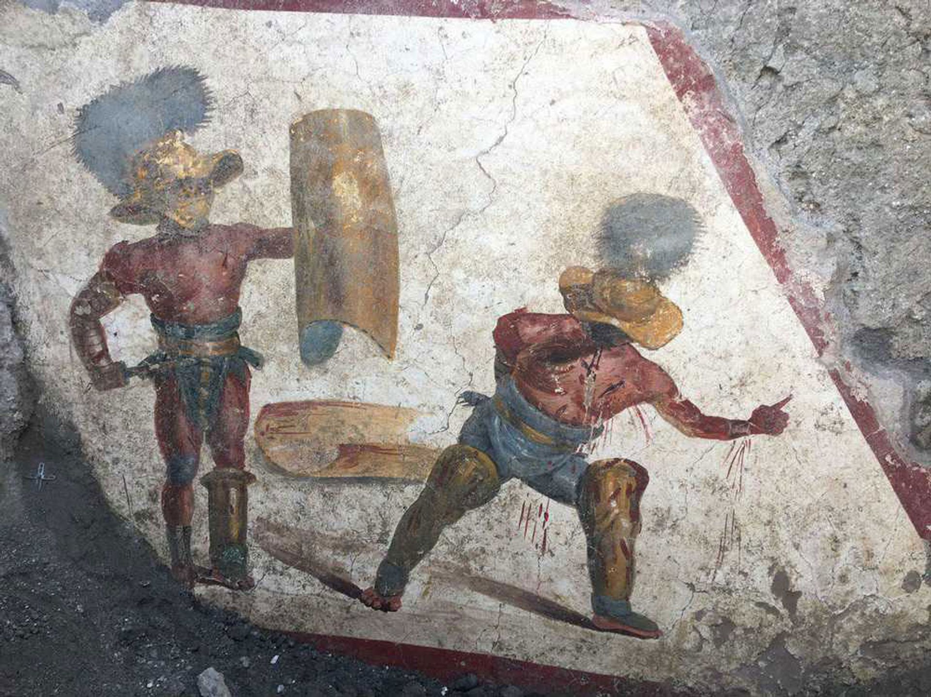 The fresco of the two gladiators uncovered in Pompeii © 2019 Ministero per i beni e le attività culturali e per il turismo