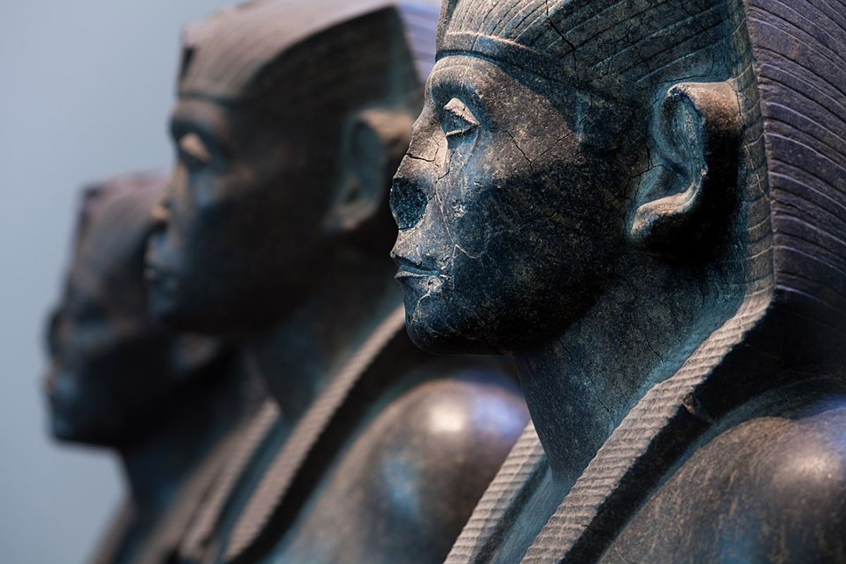 Three black granite statues of the pharaoh Senusret III, (around 1850 BC), in the collection of the British Museum, one of the many UK institutions that have been criticised for dragging their feet on colonial-era restitution © Jorge Ryan/CC