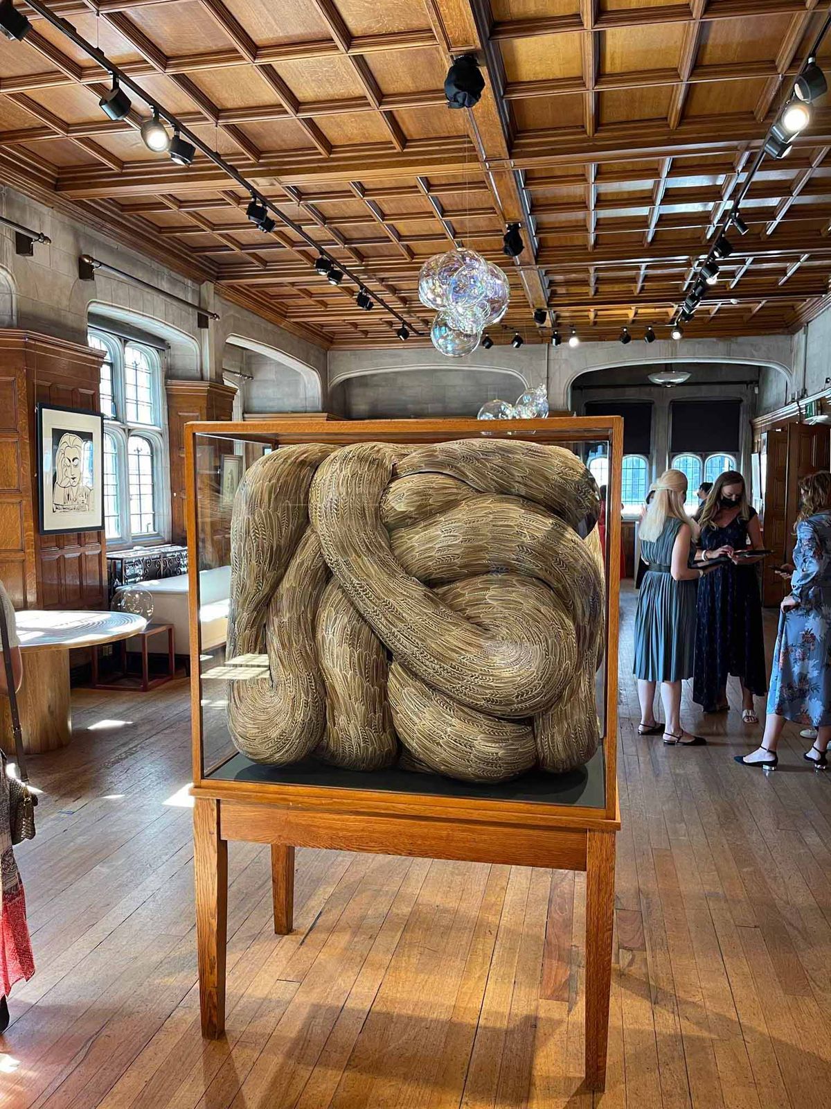 Kate MccGwire, Viscera, 2018, mixed media with pheasant feathers in antique cabinet at Eye of the Collector Photo: Gareth Harris