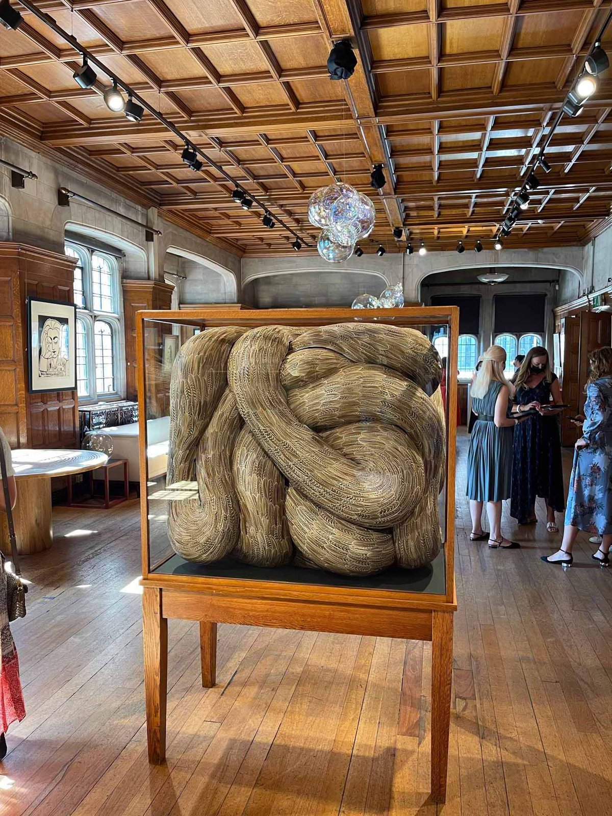 Kate MccGwire, Viscera, 2018, mixed media with pheasant feathers in antique cabinet at Eye of the Collector Photo: Gareth Harris