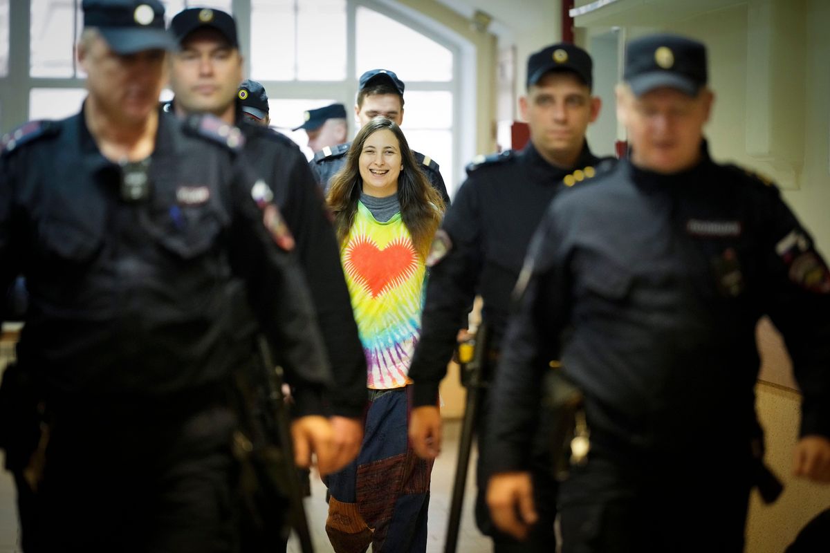 Sasha Skochilenko being escorted to a court hearing in St Petersburg last November Photo: Associated Press / Alamy Stock Photo