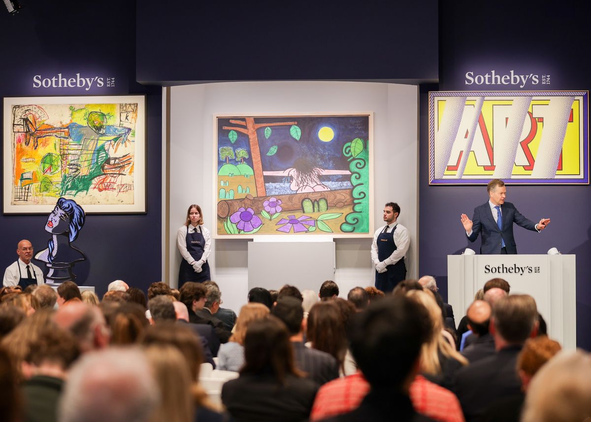 Sotheby’s auctioneer Oliver Barker fields bids on a work by Carroll Dunham from the estate of Barbara Gladstone 
Image courtesy Bre Johnson/BFA.com