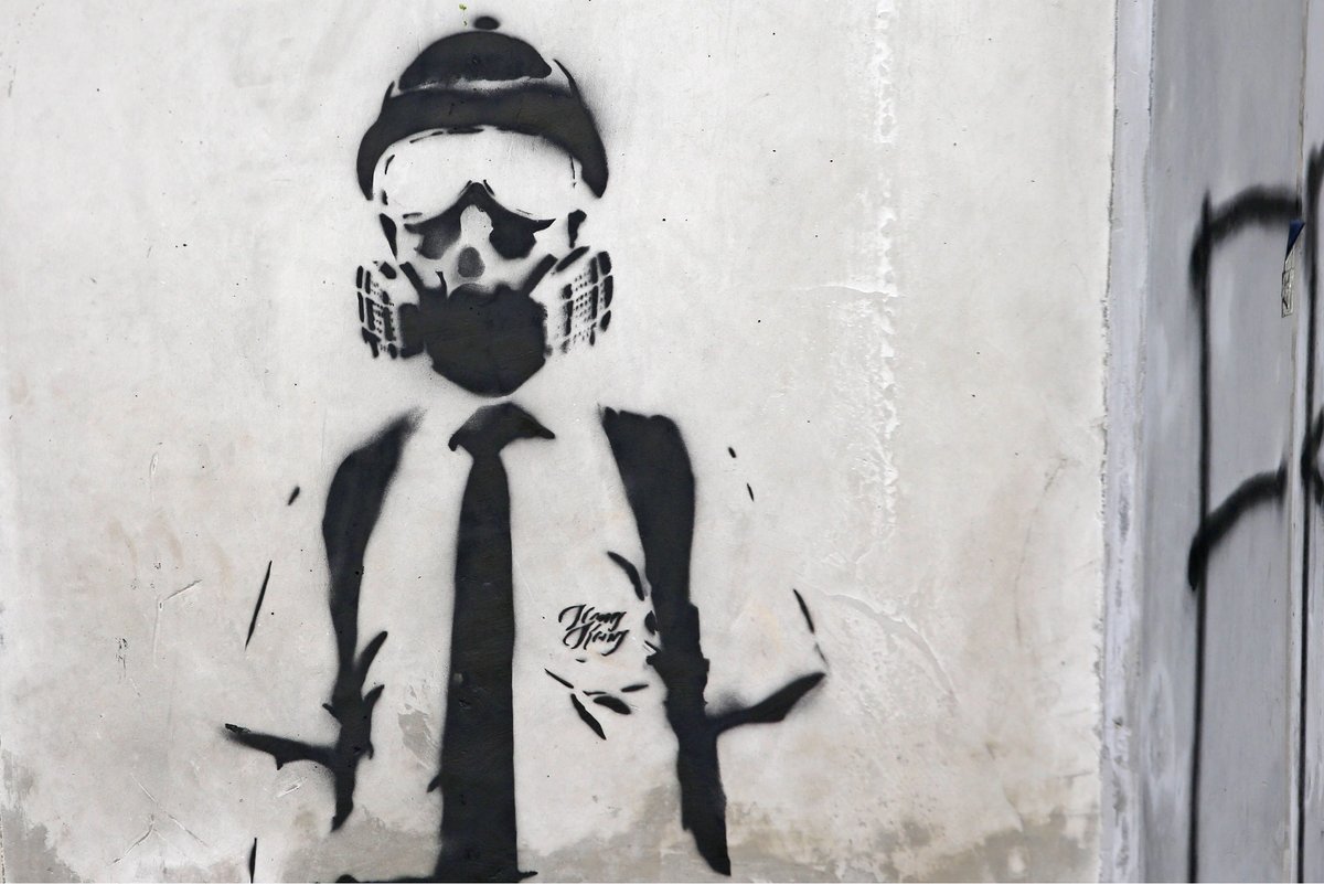 A graphic of protesters on a wall in Hong Kong on 20 October as tension in the city escalated by inaction of the government response to the five demands of the protesters. James Lee/EYEPRESS/SIPA/Shutterstock