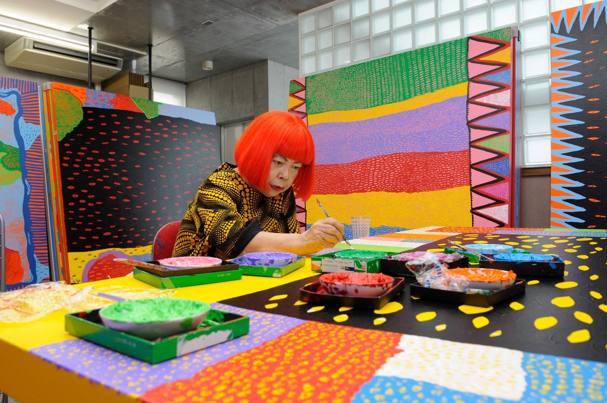 Kusama creating paintings for her My Eternal Soul series in her studio, 2014. © Yayoi Kusama