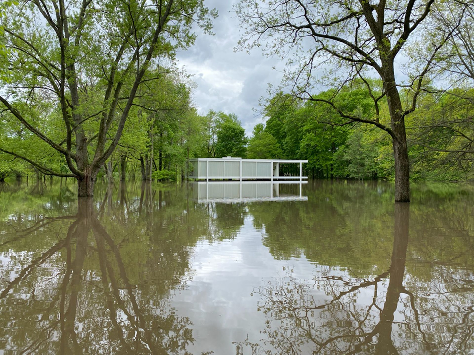 Flooding earlier this week at the Farnsworth House in Plano, Illinois along the Fox River. Farnsworth House