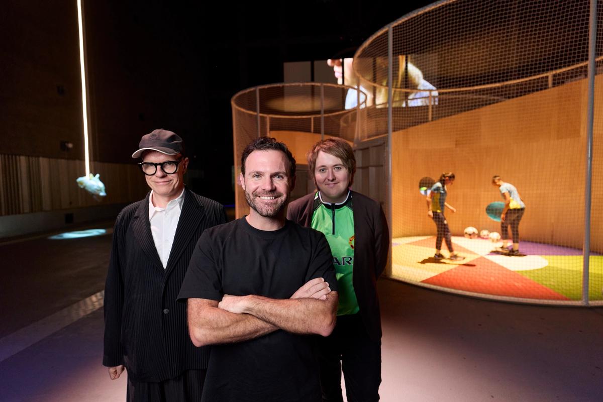 Football City, Art United’s co-curators Hans Ulrich Obrist (front left) and Josh Willdigg (front right) with the footballer Juan Mata (front centre) and the Manchester City Academy players Hannah Stengert and Aoife Colbert-Martin behind
Photo: David Levene