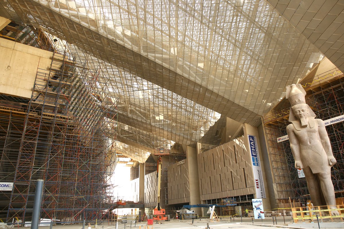 The soaring entrance hall of the Grand Egyptian Museum, where a 12m-tall, 83-ton granite statue of King Ramses II is already in place