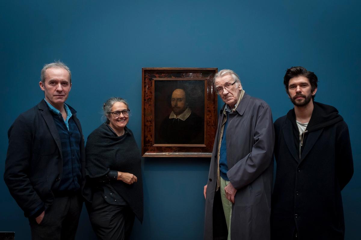 Stephen Dillane, Tacita Dean, David Warner and Ben Whishaw pose by a portrait of Shakespeare during a viewing of  Dean's new film portrait of the actors at the National Portrait Gallery on 13 March Jorge Herrera