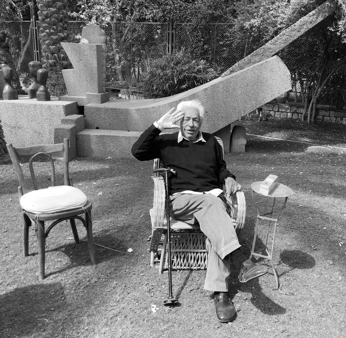 Adam Henein in his garden in Harraniyya, Cairo, in 2018 Courtesy of Rose Issa