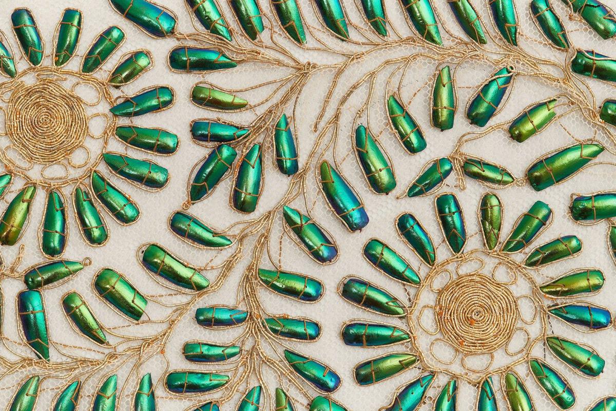 Textile length decorated with beetle wings, India. Acquired 1883. Powerhouse collection. Photo by Zan Wimberley