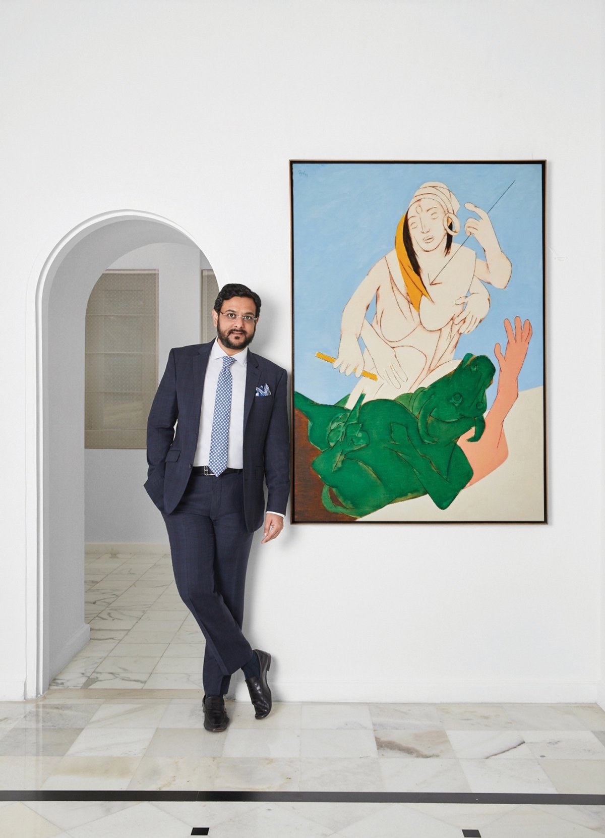 Gaurav Bhatia, the managing director of Sotheby's India, with Tyeb Mehta's Durga Mahisasura Mardini Photo: IANS