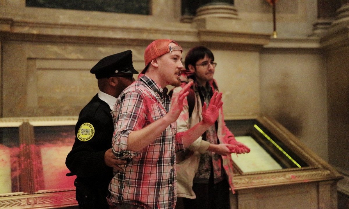 Climate activists who dumped red powder on US Constitution at National Archives sentenced to prison Climate activists who dumped red powder on US Constitution at National Archives sentenced to prison