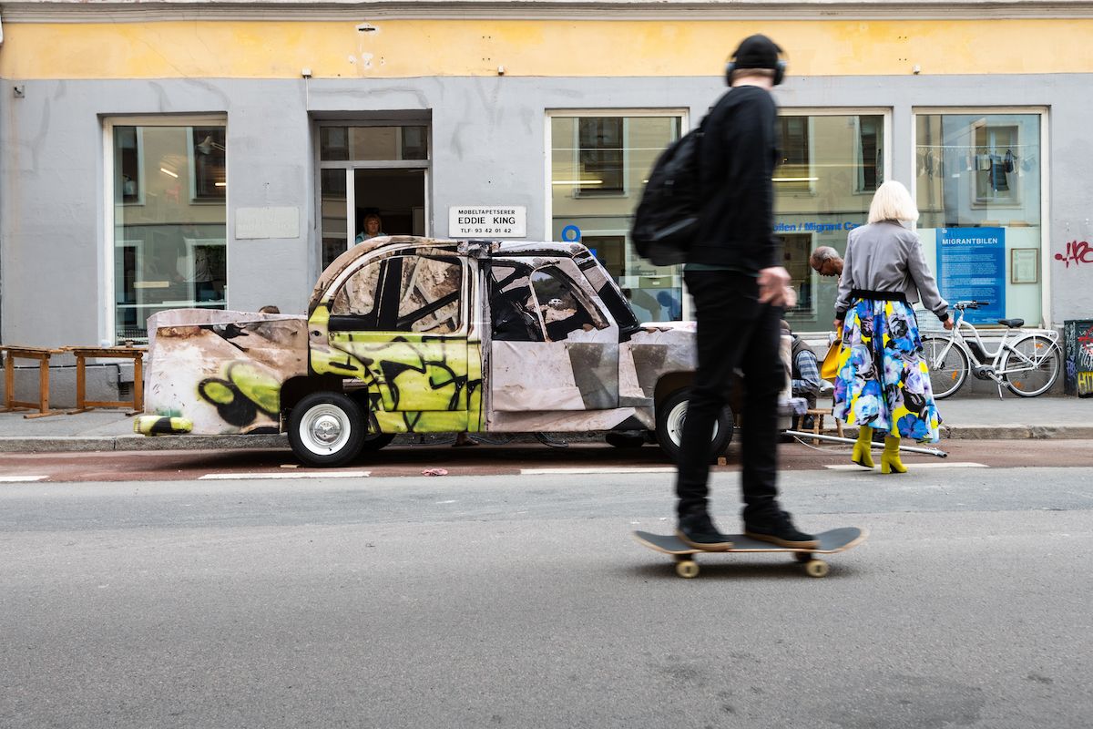 Ed D'Souza's ‘Migrant Car’ parked in front of Eddie King's Furniture and Upholstery Workshop in Grünerløkka, Oslo. Niklas Hart, Hartwork / © Oslo Biennial