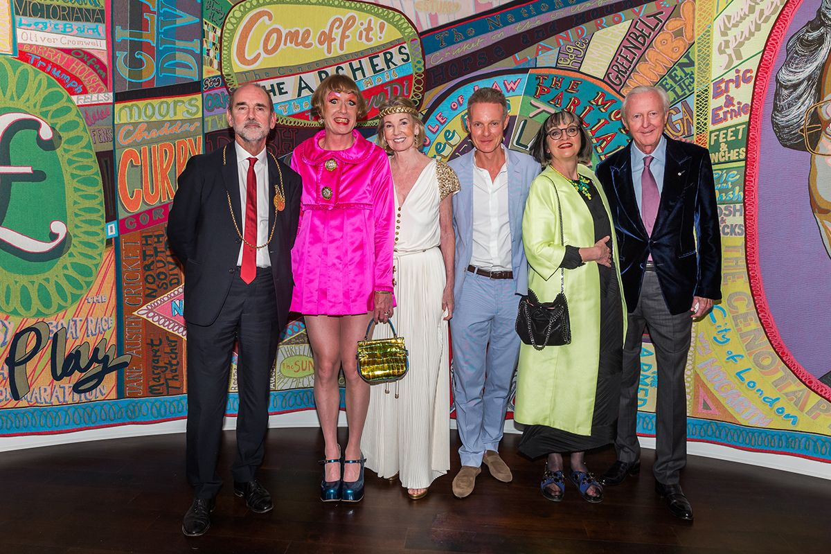 Christopher Le Brun, Grayson Perry, Hilary Weston, Tim Marlow, Philippa Perry and Galen Weston in front of Perry's Comfort Blanket (2014) Courtesy: Windsor; Photo: Scott Rudd (2018)