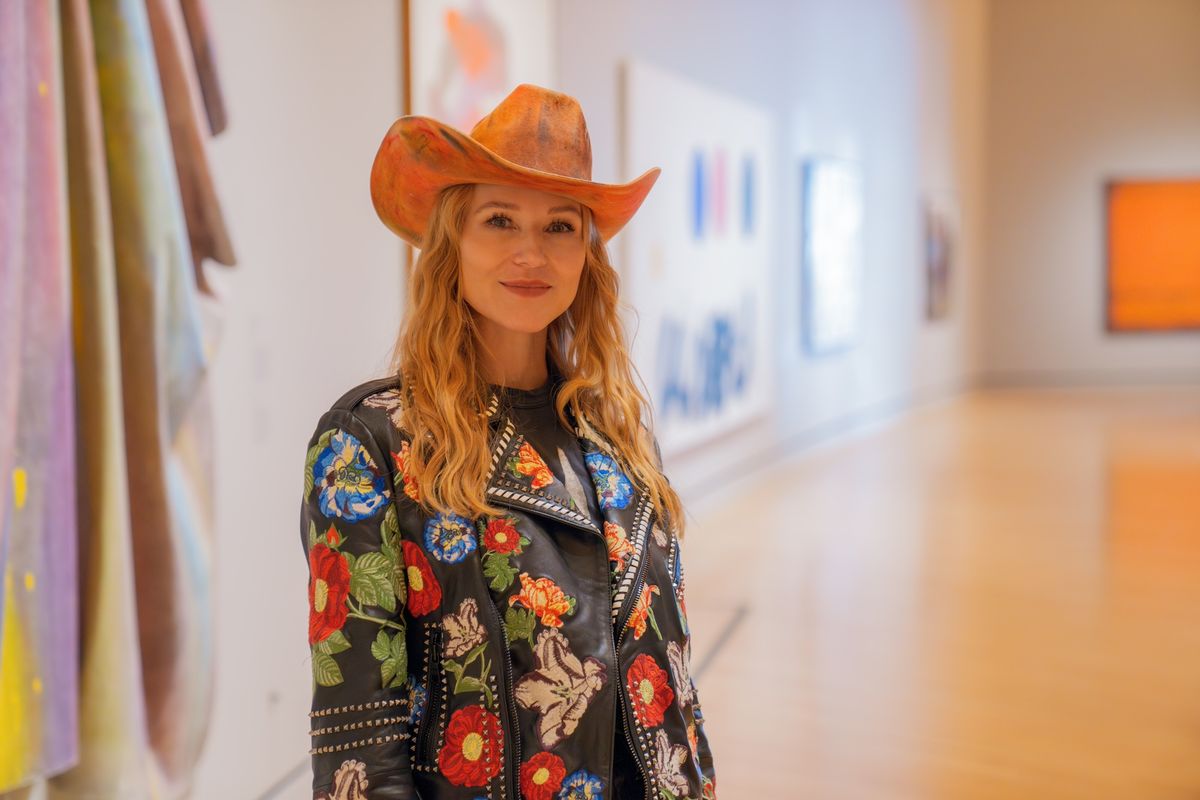 Jewel pictured with Mazda by Sam Gilliam in the Contemporary Gallery at Crystal Bridges Museum of American Art January 3-4, 2024. Photo Courtesy of Crystal Bridges Museum of American Art.