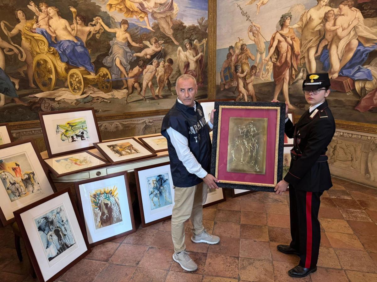 Officers from the Carabinieri TPC pose with some of the works, which were removed from display on Tuesday 30 September
Carabinieri Cultural Heritage Protection Command via AP