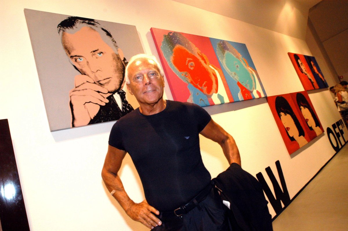 Giorgio Armani alongside his portrait by Andy Warhol, Milan, 2004
Independent Photo Agency/Alamy Live News