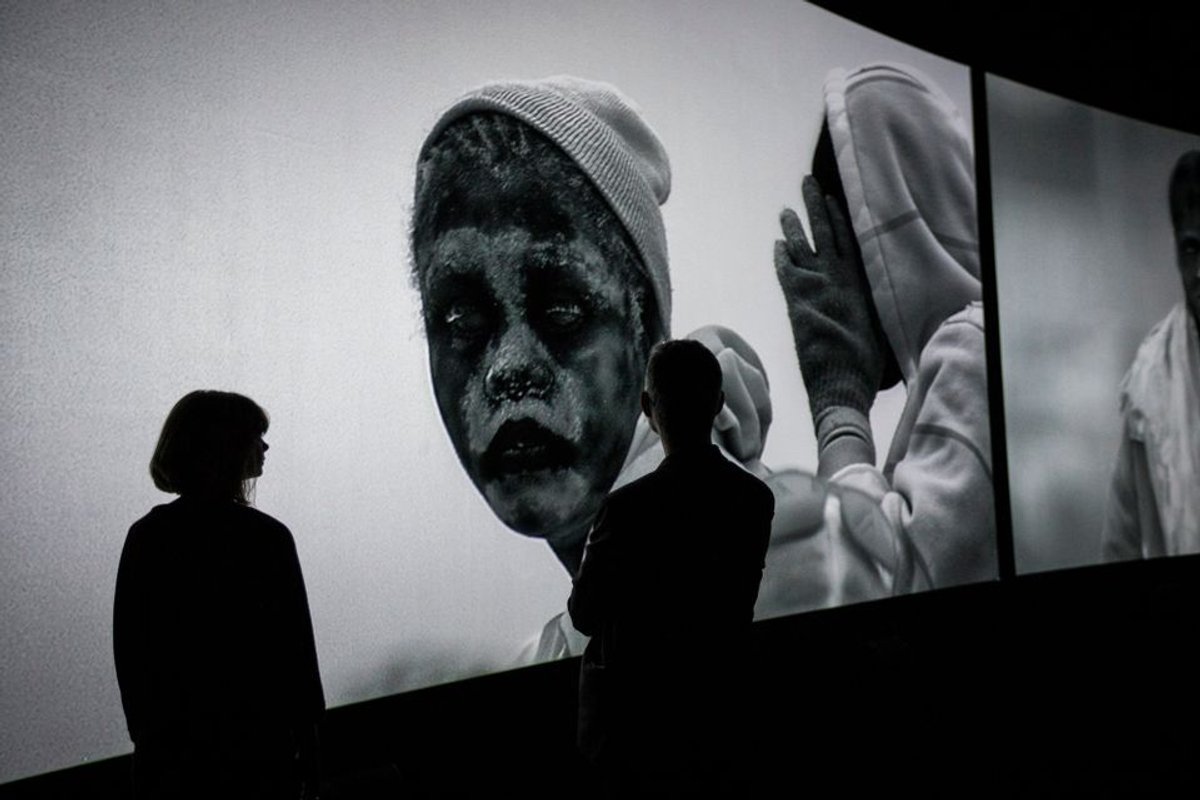 Installation View of Incoming, Richard Mosse's collaboration with Trevor Tweeten and Ben Frost at The Curve, Barbican Centre Image: © Tristan Fewings / Getty images