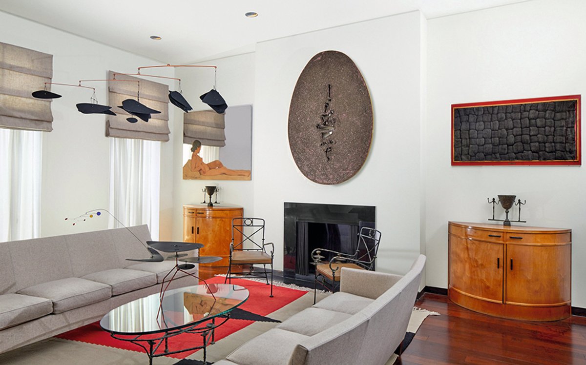 Daniella Luxembourg’s New York townhouse, with works by Fontana (above the fireplace) and Calder Courtesy of Sotheby’s