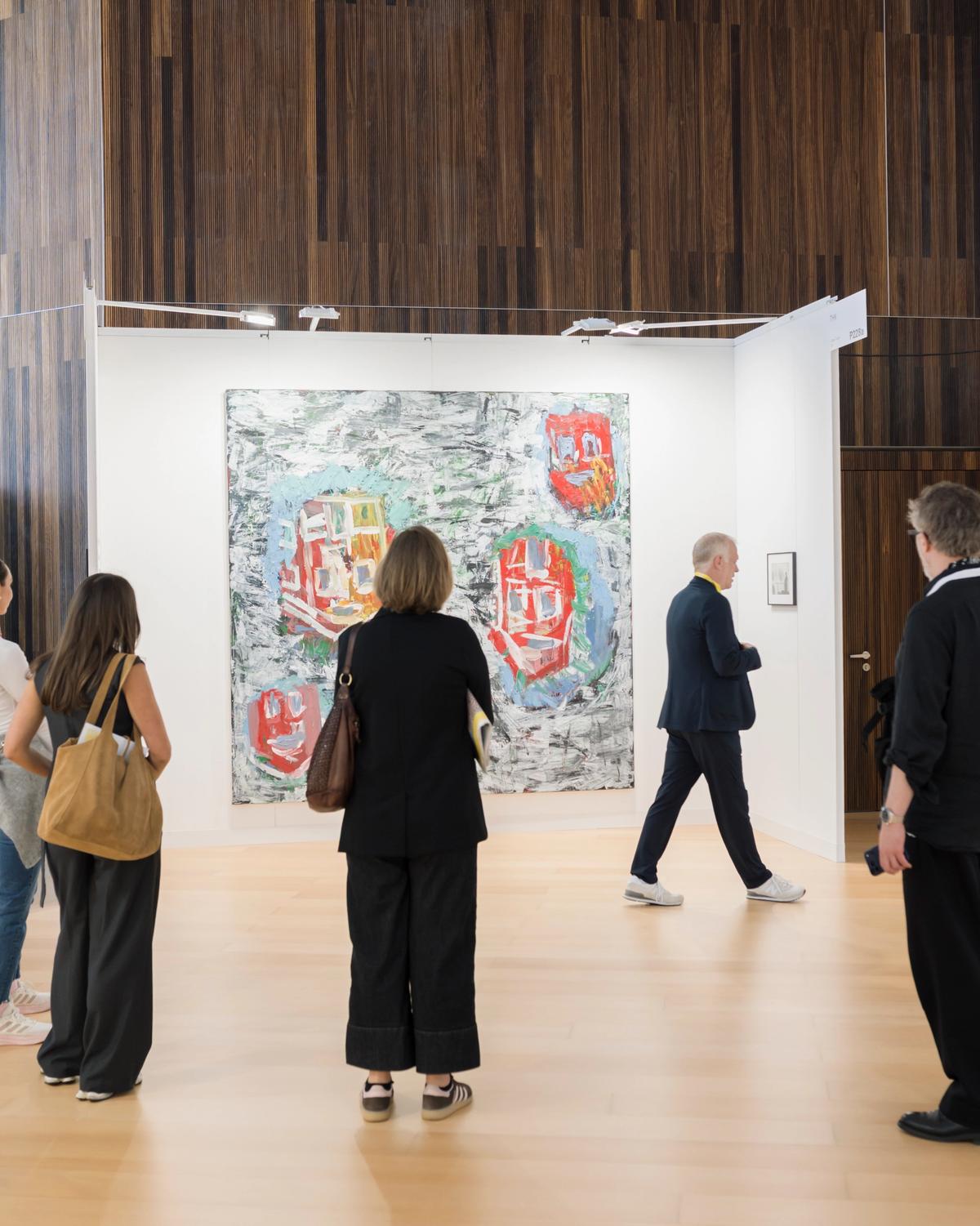 Visitors to Art Cologne Palma Mallorca, standing in front of Georg Baselitz's Horta de Ebro (1988), shown at THK gallery
Courtesy of Art Cologne Palma Mallorca