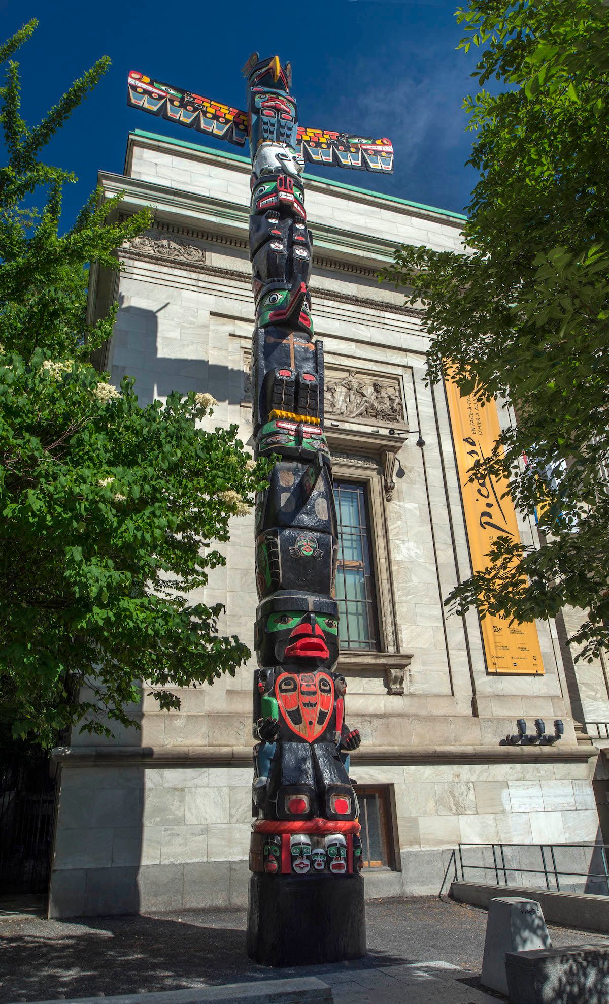 Charles Joseph’s Residential School Totem Pole (2014–16) before the left hand on the lower portion of the work was stolen Courtesy of the The Montreal Museum of Fine Arts