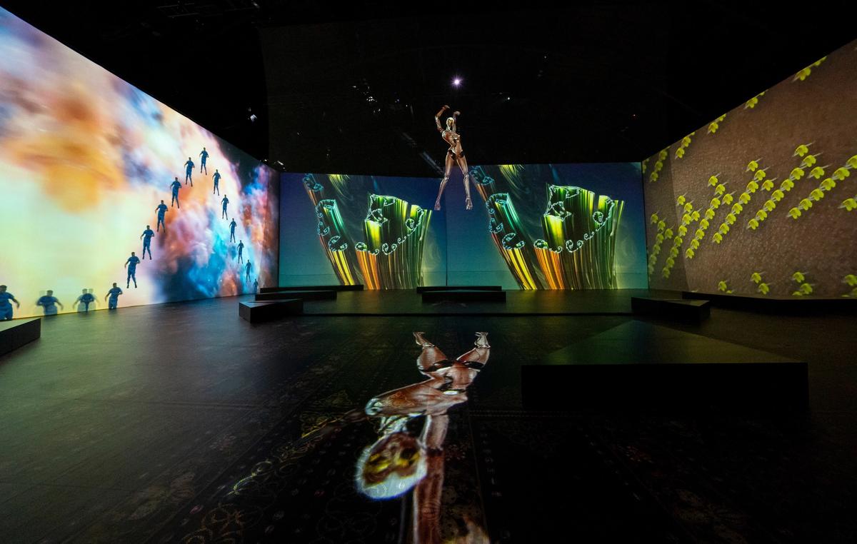 Rashaad Newsome, Assembly at Park Avenue Armory (2022). Center hologram: Wrapped, Tied & Tangled; background, left video: Black Fractal With A Twist; center video: Atmosphere of A Dream 1; right video: Cornrow (all works 2022). Courtesy Rashaad Newsome Studio. Photo: Stephanie Berger Photography/Park Avenue Armory.