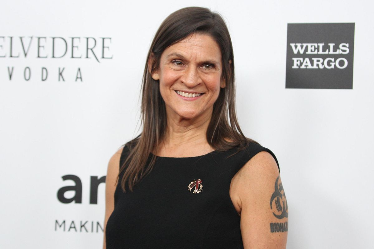 Philanthropist Aileen Getty, pictured here at a 2013 amfAR gala in Los Angeles, has funded climate activist groups such as Just Stop Oil, which glued their hands to the wall after throwing tomato soup over Vincent Van Gogh's Sunflowers (1888) at the National Gallery in London last week. Photo: WENN Rights Ltd / Alamy Stock Photo