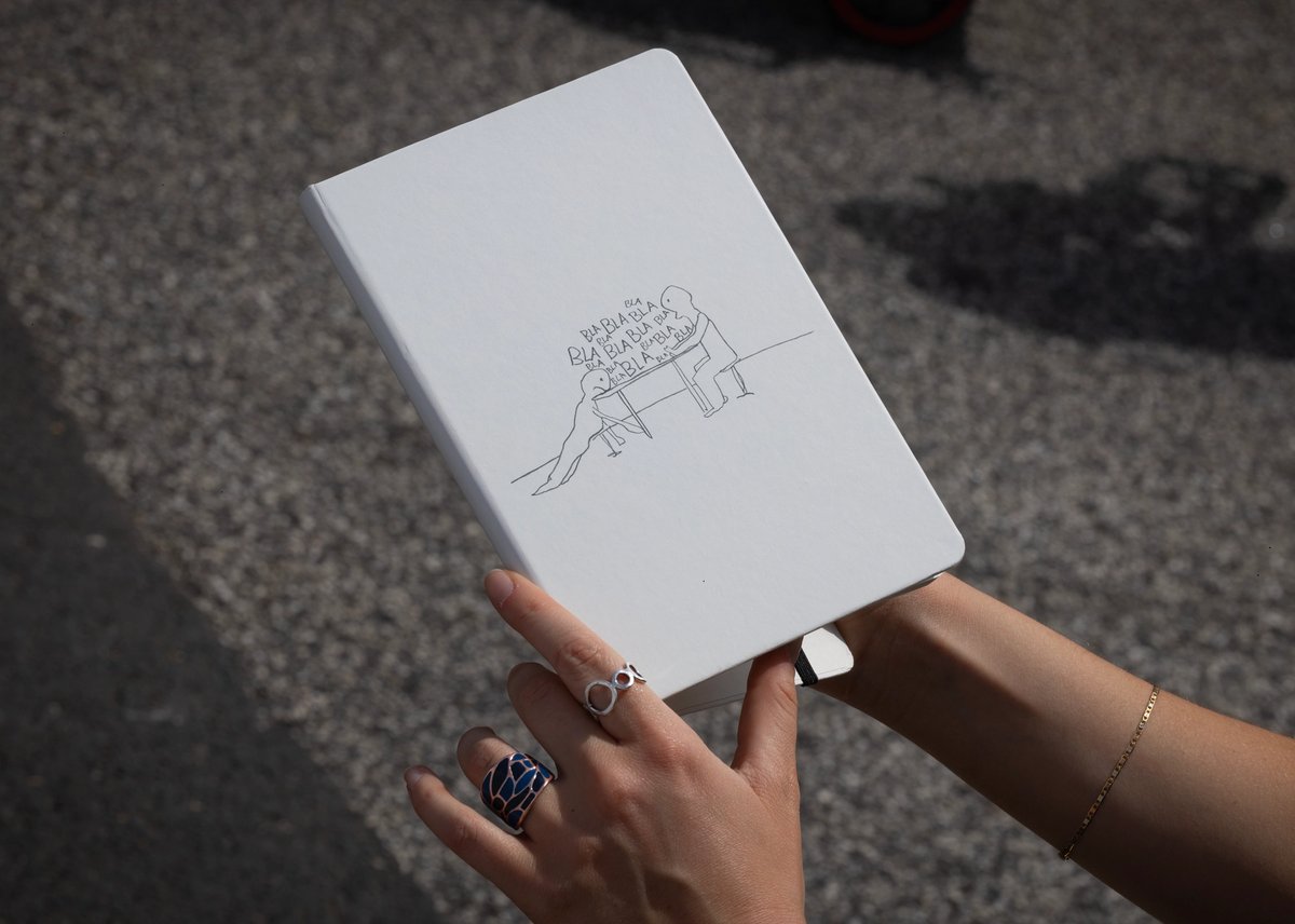 Hurry! Hurry! UBS is giving away notebooks by Olaf Bruening © 2026 Peter Macdiarmid for UBS