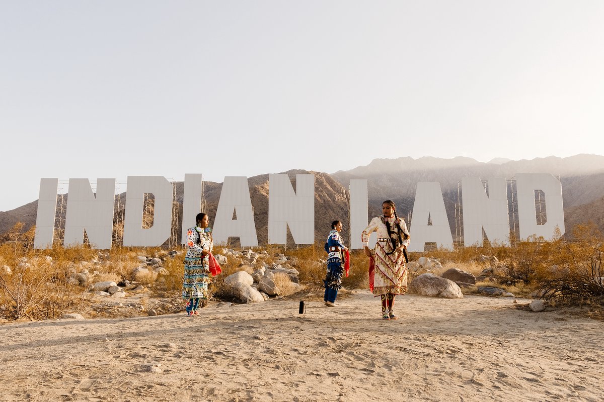 A performance at Nicholas Galanin's Never Forget (2021) at Desert X 2021. Photography by Lance Gerber, courtesy the artist and Desert X. LANDBACK GoFundMe