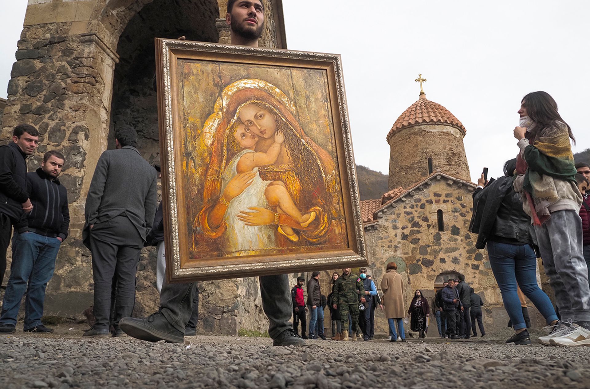 A man held an icon from the Dadivank, an Armenian Apostolic Church monastery dating to the ninth century in the district of Kalbajar, as ethnic Armenians prepared to leave on 14 November. The district is being turned over to Azerbaijan as part of a Russian-brokered peace accord to end six weeks of fighting in Nagorno-Karabakh. Associated Press