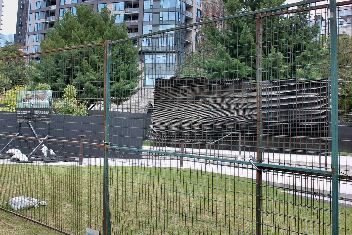 The $5.4m public monument remains fenced off and undedicated, with the unveiling indefinitely postponed due to controversy over inadvertently honouring fascists, Nazi collaborators and suspected war criminals
Photo: Taylor C. Noakes